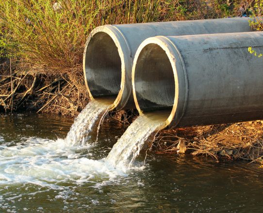 Diagram comparing a septic system with a municipal sewage connection